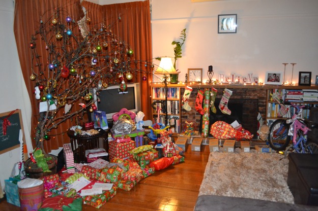 Santa's handy work with reclaimed wrapping paper, ribbons and gifts